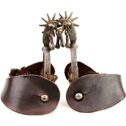 Unmarked iron spurs engraved with jingle bobs