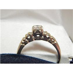 RING - CUSTOM MADE WHITE GOLD LADIES RING 18K GOLD STAMP AND  A CLAW SETTING FIVE DIAMONDS ONE IN TH