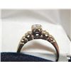 Image 1 : RING - CUSTOM MADE WHITE GOLD LADIES RING 18K GOLD STAMP AND  A CLAW SETTING FIVE DIAMONDS ONE IN TH