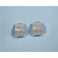 An exceptional pair of 18kt gold and diamond...