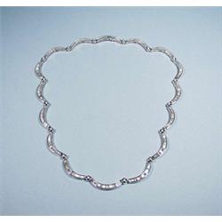 An unusual 18kt white gold and diamond neckla...