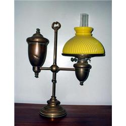 Adjustable brass single student oil lamp. Yellow ribbed shade. Pullman Atwood shade is a reprodu...