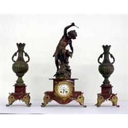 Three piece figural clock set. "RA Genret Vijon" on face. Spelter figure of a boy fighting off a...