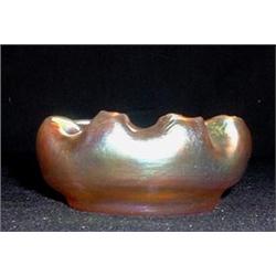 Tiffany salt dish with crimped edge. Signed with paper label and engraved LCT. 2 1/2" diameter $...