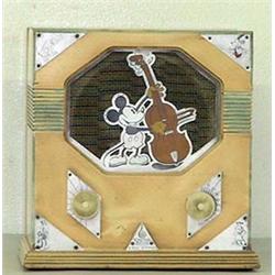 Mickey Mouse Emerson radio 1933 model. Paint and metal corners slightly faded. Not working but t...