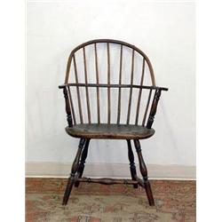 Windsor arm chair. Some traces of old paint. Circa 1800. Note crack in back. Seat is 16"h 35"w X...