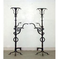 Hand-forged andirons. Unusual proportions being 51 1/2" h. Top is formed to receive an urn. Each...