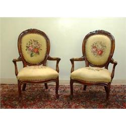 American Victorian Louis XV style armchair. Finger carved with nut and leaf design on top. Resto...