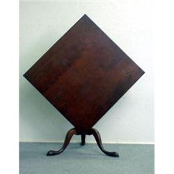 Snake leg pad-foot square-top cherry tilt top tea table. Three board top. 28 h X 30 1/2 w X 25 d...