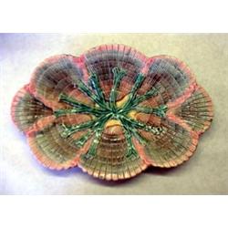 Etruscan majolica platter. Seashell and seaweed. Note minor rim flakes. 13 1/2" $200-300...