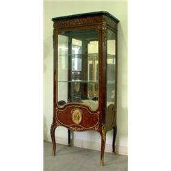 Parquetry inlaid black marble-topped French Louis XV style vitrine. Bronze ormolu and central ov...