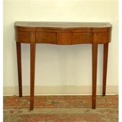 Mahogany inlaid hepplewhite card table. Dovetailed case. Four legs and a swing leg. Circa 1820....