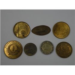 Seven tokens and medals