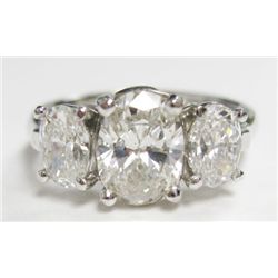 Designer Signed Platinum Setting w/ GIA Certified Oval Cut Diamonds - Center oval brilliant - GIA# 2