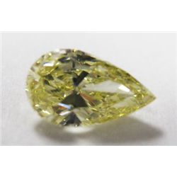 GIA Certified 1.03 carat Pear Modified Brilliant. Natural Fancy Yellow Color/VVS2 Clarity. Medium Bl