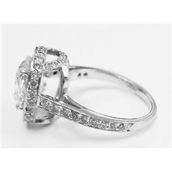 GIA Certified 3.02 carats Cushion Brilliant Diamond set in Platinum Basket Setting w Round Pave Diam