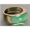 Image 1 : One man's ring in 14k yellow gold set with a custom cut green jade. Estimate $1,000-1,500