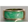 Image 2 : One man's ring in 14k yellow gold set with a custom cut green jade. Estimate $1,000-1,500