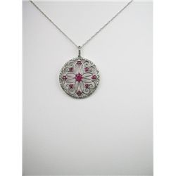 Detailed Mosaic style Ruby and Diamond Pendant with 68 diamonds set in 10 karat white gold. Estimate