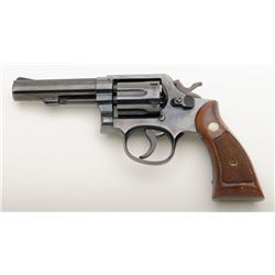 Smith & Wesson Model 10-6 DA revolver, .38 Special cal., 4” heavy barrel, blue finish, checkered woo