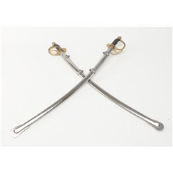 Two reproduction model 1860 Cavalry sabers made for Re-enactors. Est.: $50 - $100.