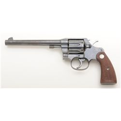 Colt New Service DA revolver, .38-40 cal., 7-1/2” barrel, blue finish, checkered wood medallion grip