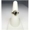 Image 2 : Striking Sapphire and Diamond Ring with 18 baguette cut diamonds set in 14 karat yellow gold. Retail