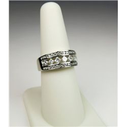 Exquisite High Quality Diamond Ring with 7 Princess cut and 34 round brilliant cut diamonds weighing