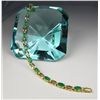 Image 1 : Elegant Colombian Emerald Bracelet with 11 oval emeralds weighing approx. 7.00 carats total accented