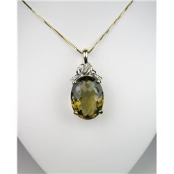 Exceptionally Large Quartz Pendant weighing approx. 50-60 carats with 6 accent diamonds set in 14 ka