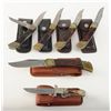 Image 2 : Lot of 6 large folders with leather sheaths including makers Schrade, Buck and Uncle Henry, all in g