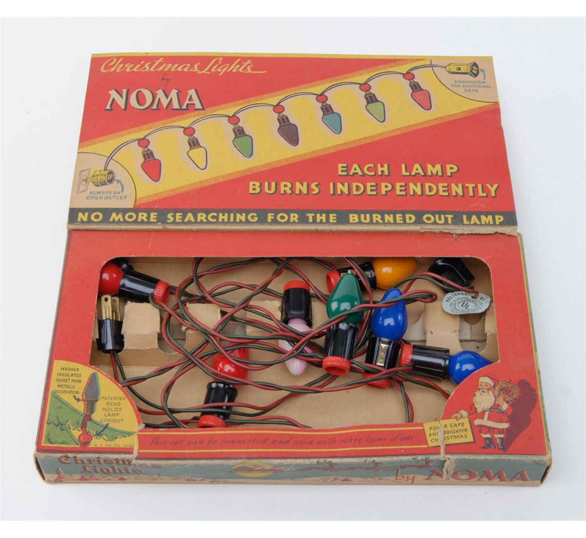 A box of original Christmas lights by Noma circa 1928 and a box of