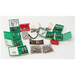 A large lot of reloading dies, brass and ammo. 11 sets of dies including RCBS, Hornady and CH manufa