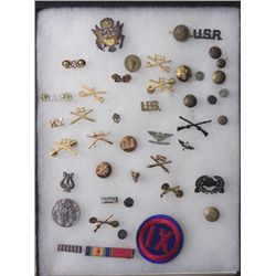 LOT OF US MILITARY INSIGNIA, PATCHES ETC-IN RIKER MOUNT