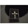 Image 1 : STAINLESS STEEL CROSS WITH A STONE IN THE MIDDLE