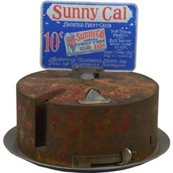 10 Cent "SUNNY CAL" Tin Cake-Shaped Fruit-Cake Vending