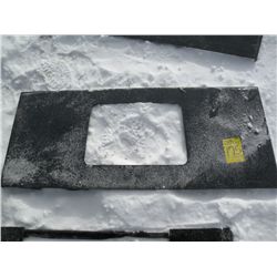 Tool plate for skid loader