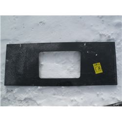 Tool plate for skid loader