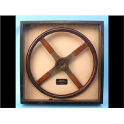 A Darracq 12/40 hp Steering Wheel, in a glaze...