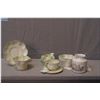 Image 1 : A selection of early Irish Belleek including a Neptune cups and saucer, two hexagon cups and a sauce