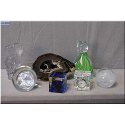 A selection of collectibles including amethyst geode, glass paperweights, etc