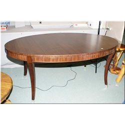 A modern Ethan Allen dining table with two leaves