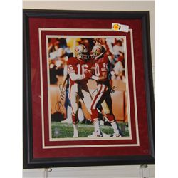 8x10 Framed and Double Matted Color Photo autographed by Joe Montana and Jerry Rice.  Appraised or e