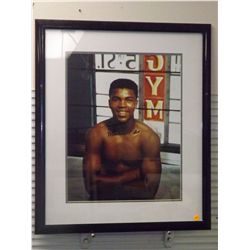 Muhammad Ali Autographed Photo. Framed and Matted Photo of Young Ali. Appraised or estimated retail 