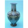 Image 1 : A Royal Doulton blue ground baluster vase, painted and moulded with stylised tulips and conifers,...