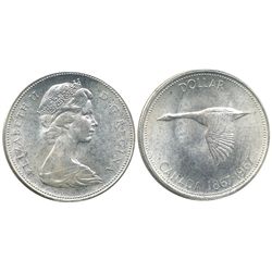 1967 $1 ICCS MS65.  White with speckled tones.