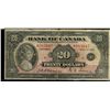 Image 1 : 1935 $20 BC-9b #A083947.  VG+ for grade with minor border splits.