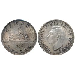 1937 $1 ICCS MS64/PCGS MS63.  Strong lustre, looks better.