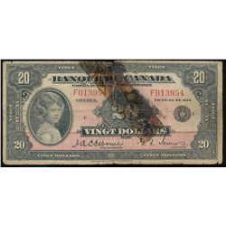 1935 $20 BC-10 #F013954.  A better french issue, Repaired with dark glue residue.  VG+ for grade.