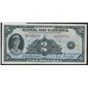 Image 1 : 1935 $2 BC-3 #A2766712, VF with minor rim tear.